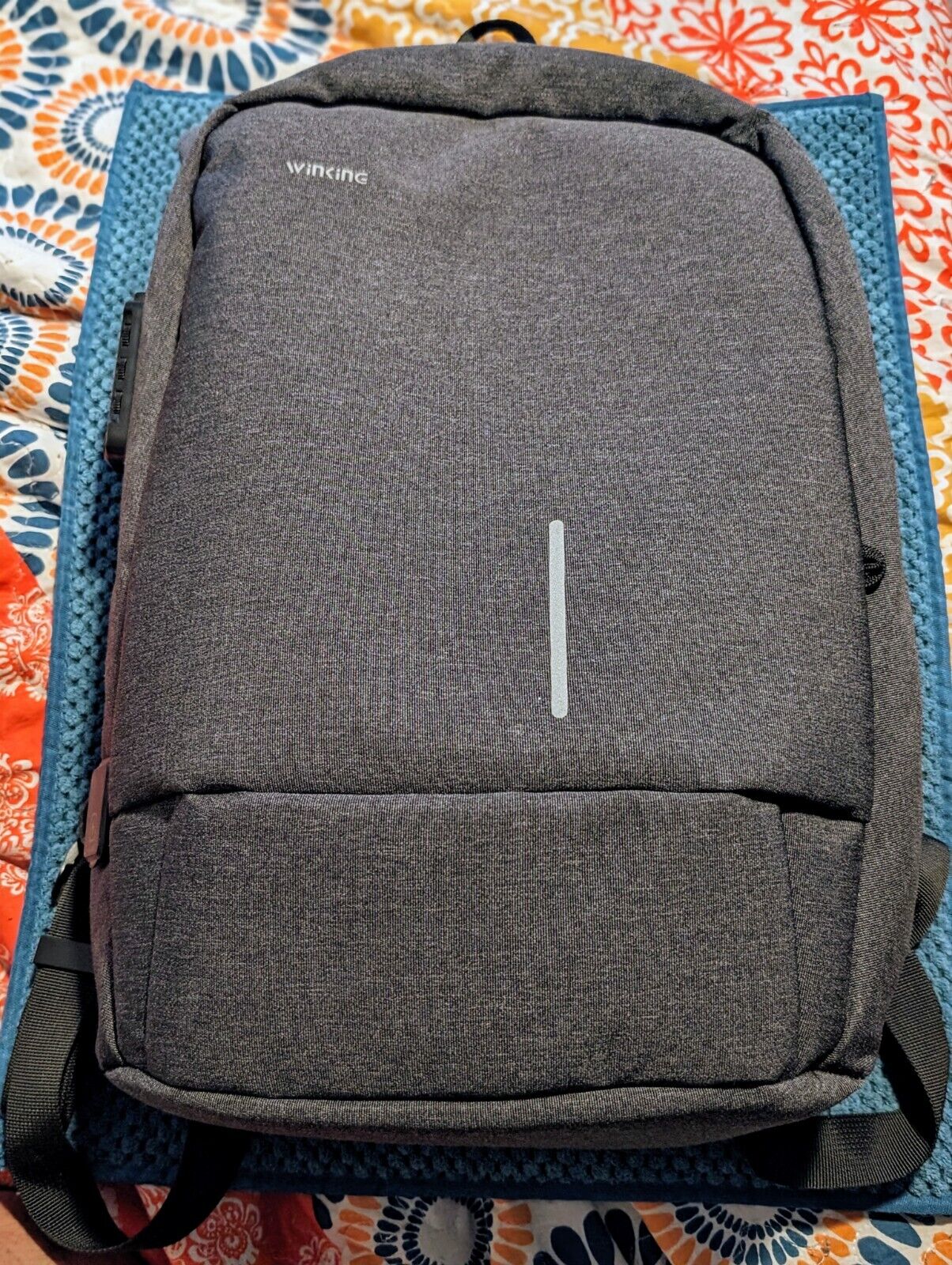 Winking Travel Laptop Backpack for international travel USB Zips From Inside 