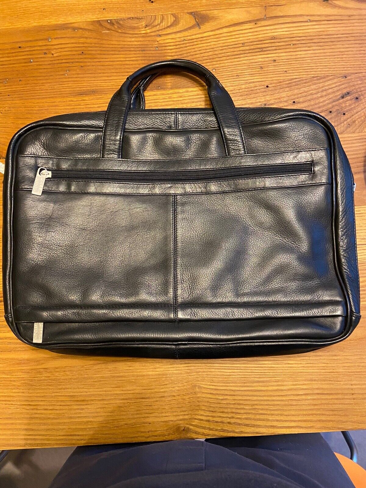Wilson’s Leather Pelle Studio black leather briefcase