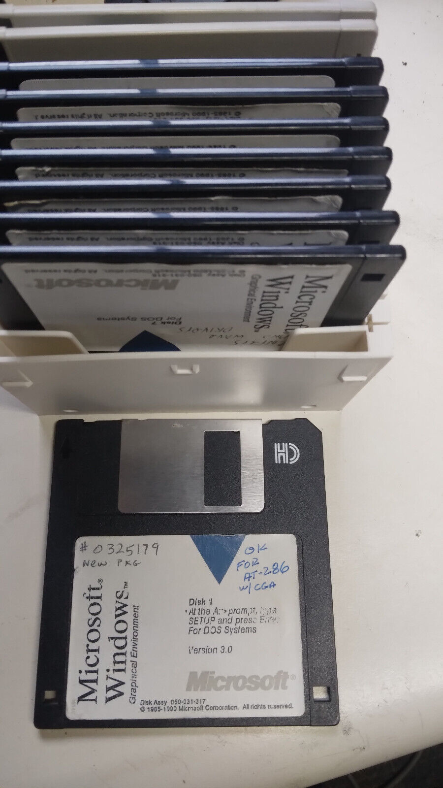Microsoft Windows 3.0 on 1.44 FD. 8-disk set with activation code.