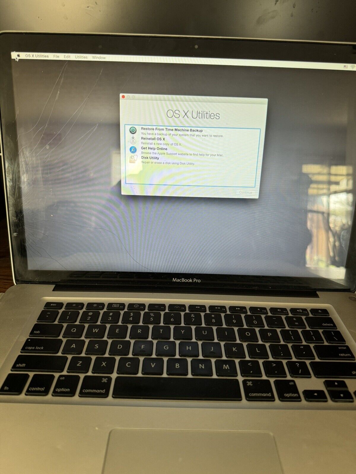 APPLE MACBOOK PRO 15” 2008 WORKS AND STUCK ON OS X YOSEMITE ***FOR PARTS ONLY***