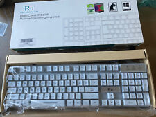 Rii RK100+ Mixed Color LED Backlit Multimedia Gaming Keyboard picture