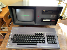 Vintage Kaypro 2X luggable computer with disks and carrying case picture