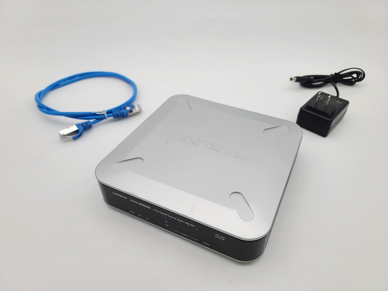 CISCO RVS4000 SMALL BUSINESS 4-PORT GIGABIT VPN SECURITY ROUTER  W ADAPTER CABLE