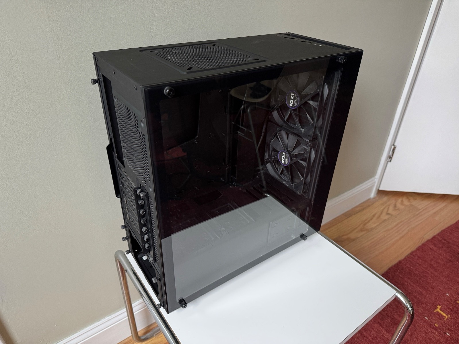NZXT S340 Elite black computer case with tempered glass panel
