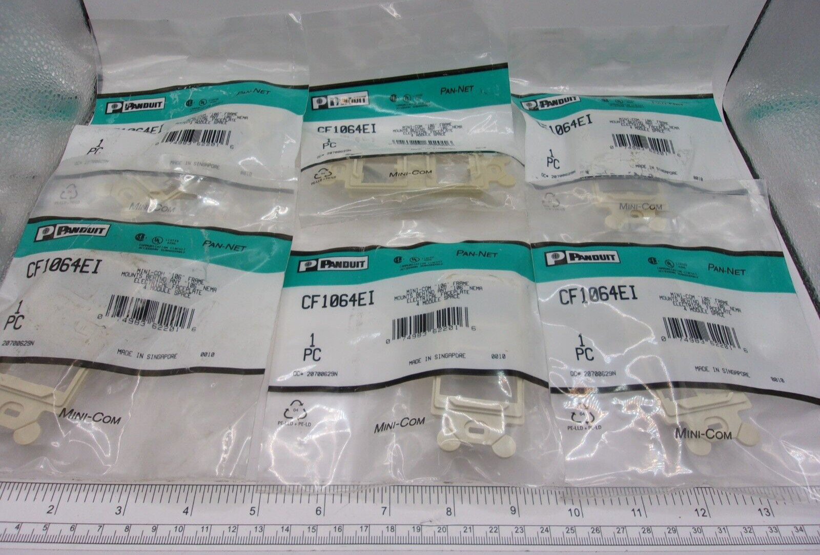 (LOT OF 6) PANDUIT, CF1064EI Mini-Com Frame 4-Port Ivory, 1669A