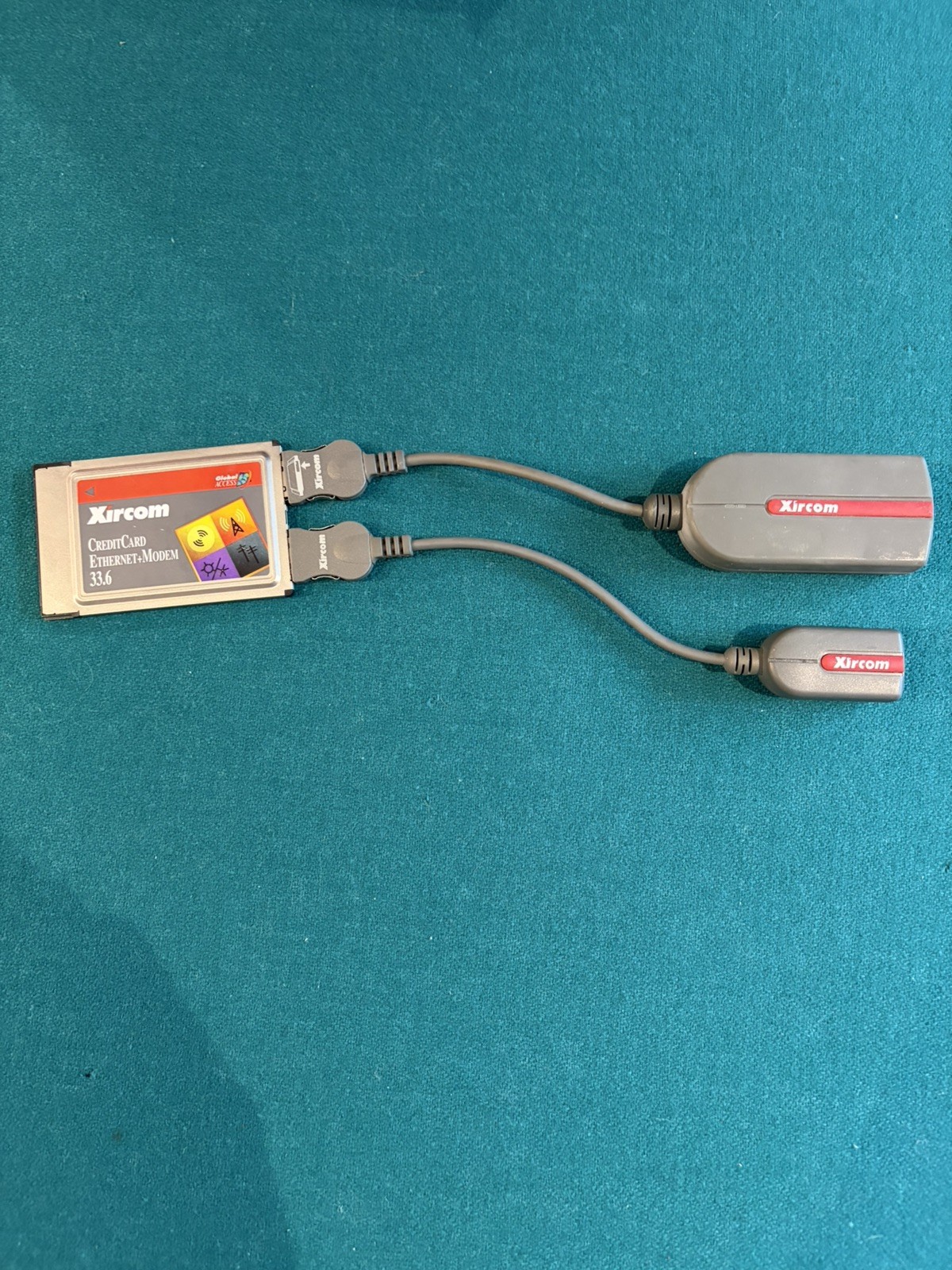 Xircom CEM33 CreditCard Ethernet + Modem 33.6 PCMCIA Card w/ Both Dongles