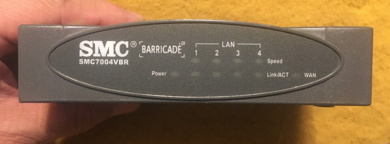 SMC Barricade SMC7004ABR 4 Port 10/100 Mbps Broadband Router/switch with adapter