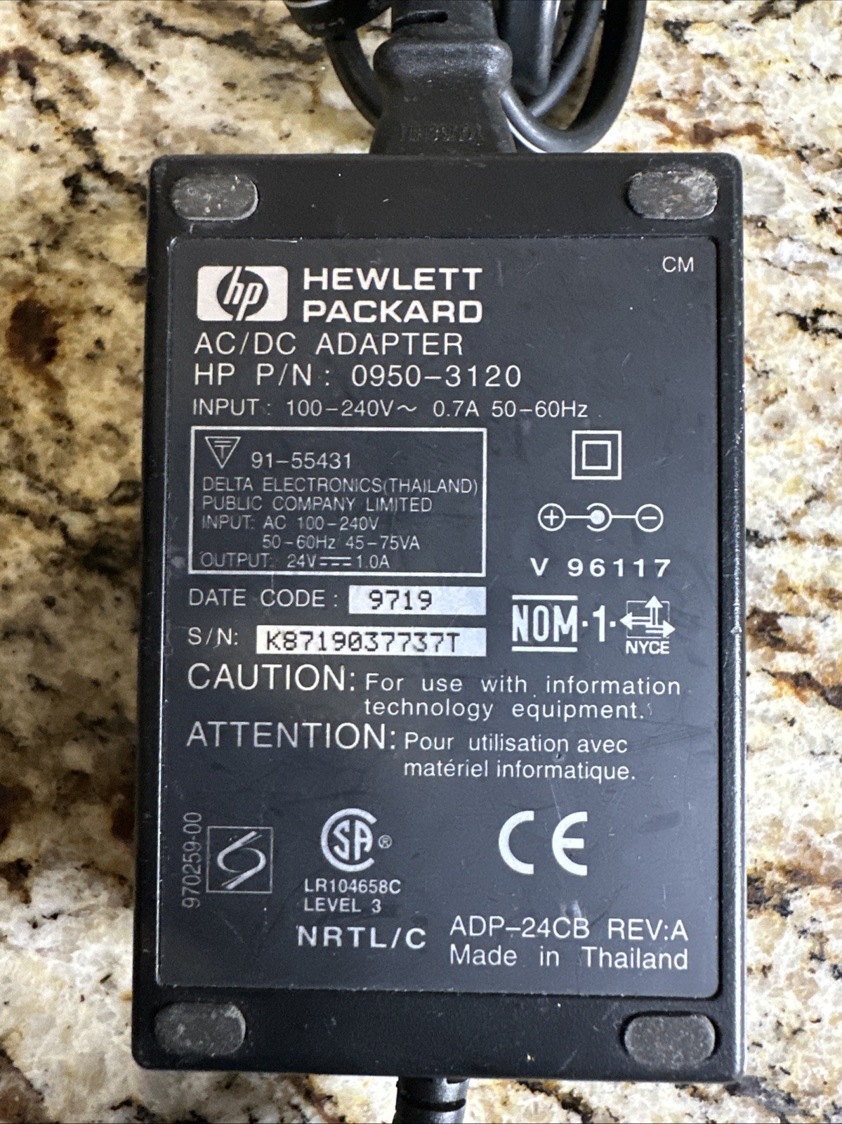 Hewlett-Packard AC/DC adapter, specifically model HP 0950-3120 