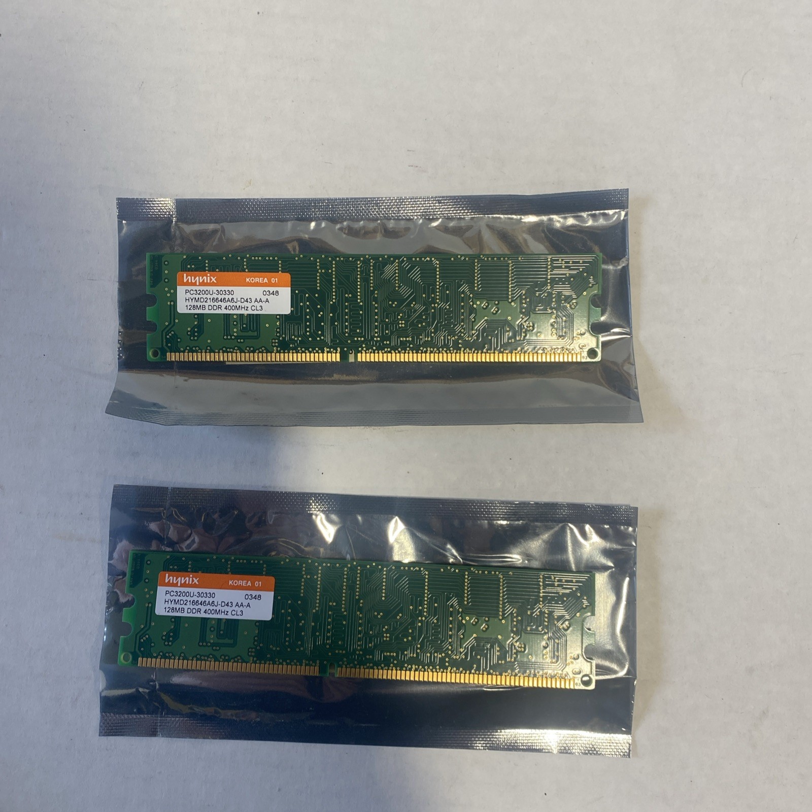 2X Hynix 128MB DDR 400 RAM PC2-3200U-30330 CL3 HYMD216646A6J-D43 AA-A