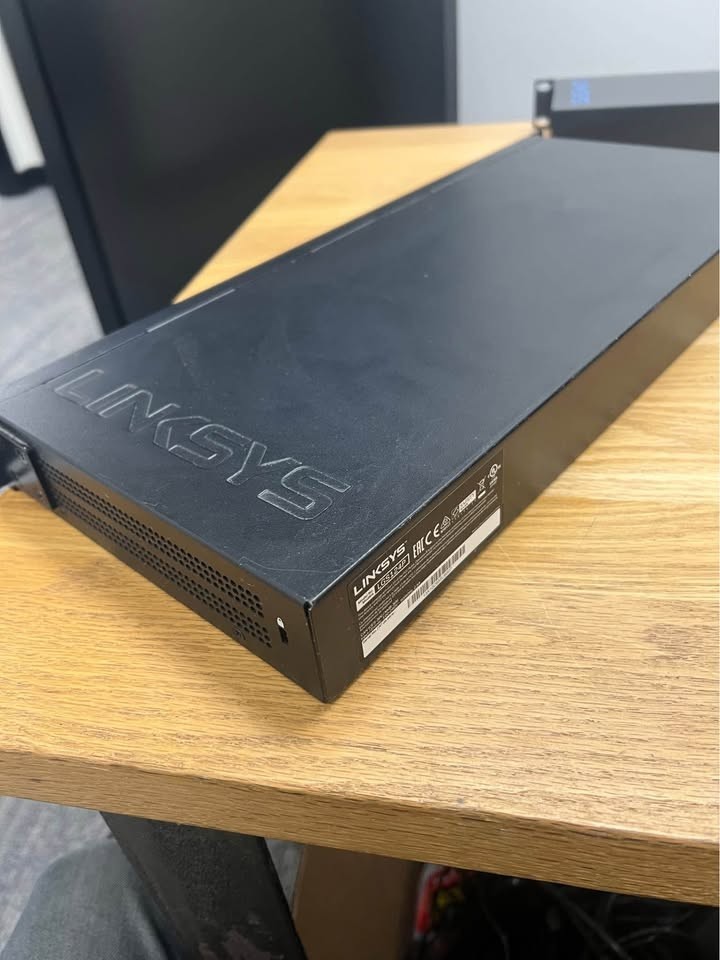 Two Linksys 24 port Metallic Gigabit Ethernet Switches