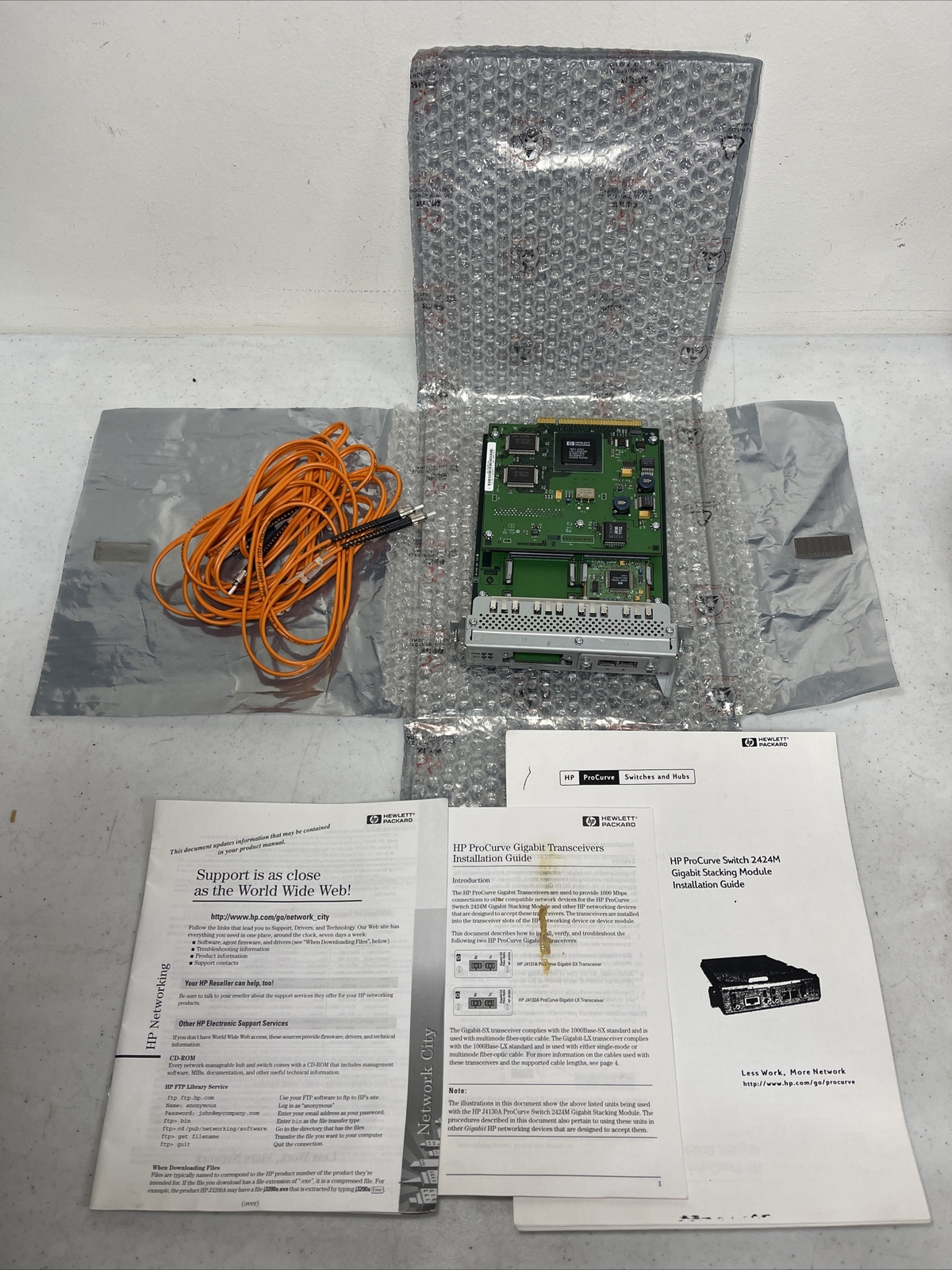 HP ProCurve Switch 2424M J4130A w/ Gigabit-SX Fiber-Optic HP J4131A with Cable