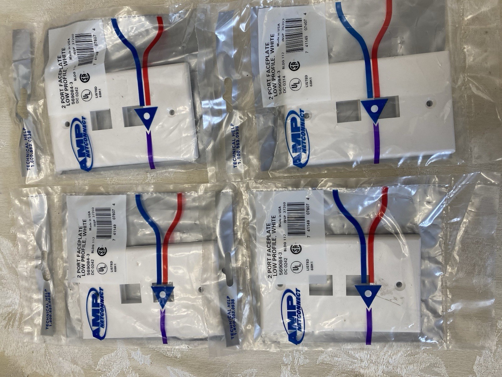 4 - NEW 2 PORT AMP NETCONNECT FACEPLATE LOW PROFILE, WHITE PART NO 569084-3 USA