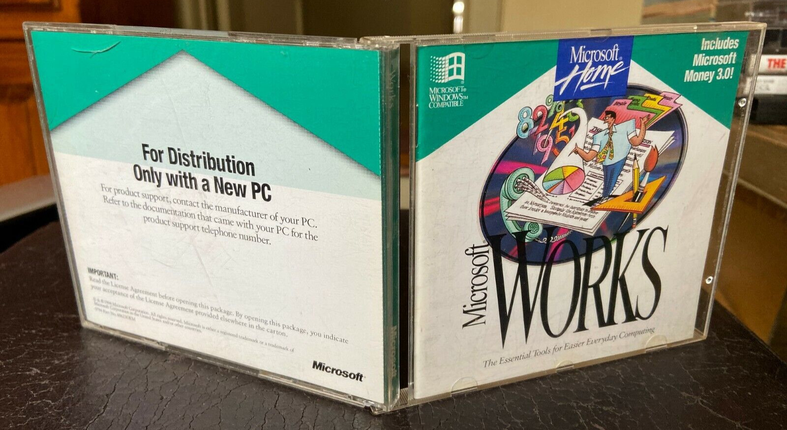 Microsoft Home: Works, 1994, including Money. PC operating system software CD.