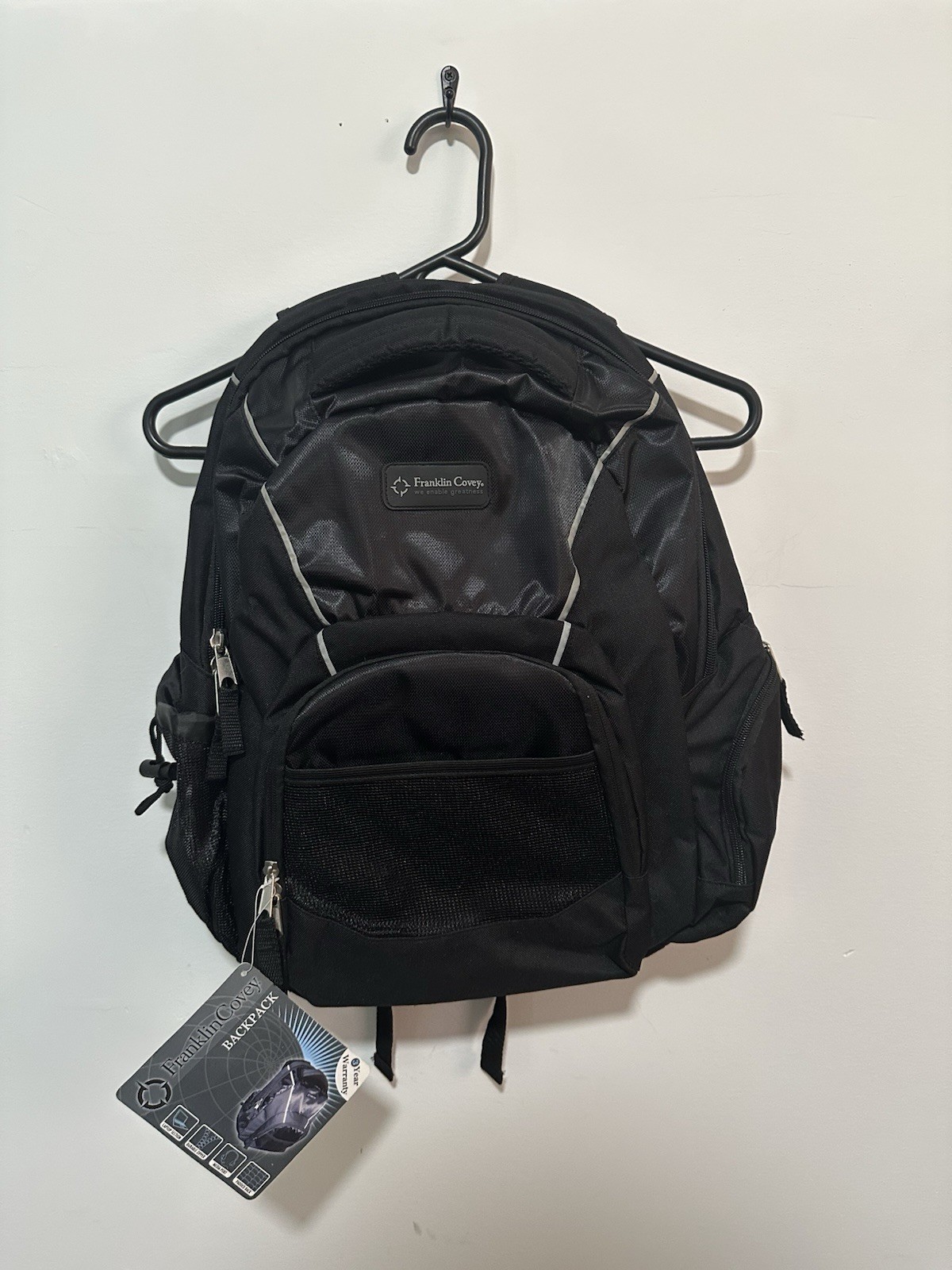 Franklin Covey Backpack-Laptop section, durable zipper,media port, padded back
