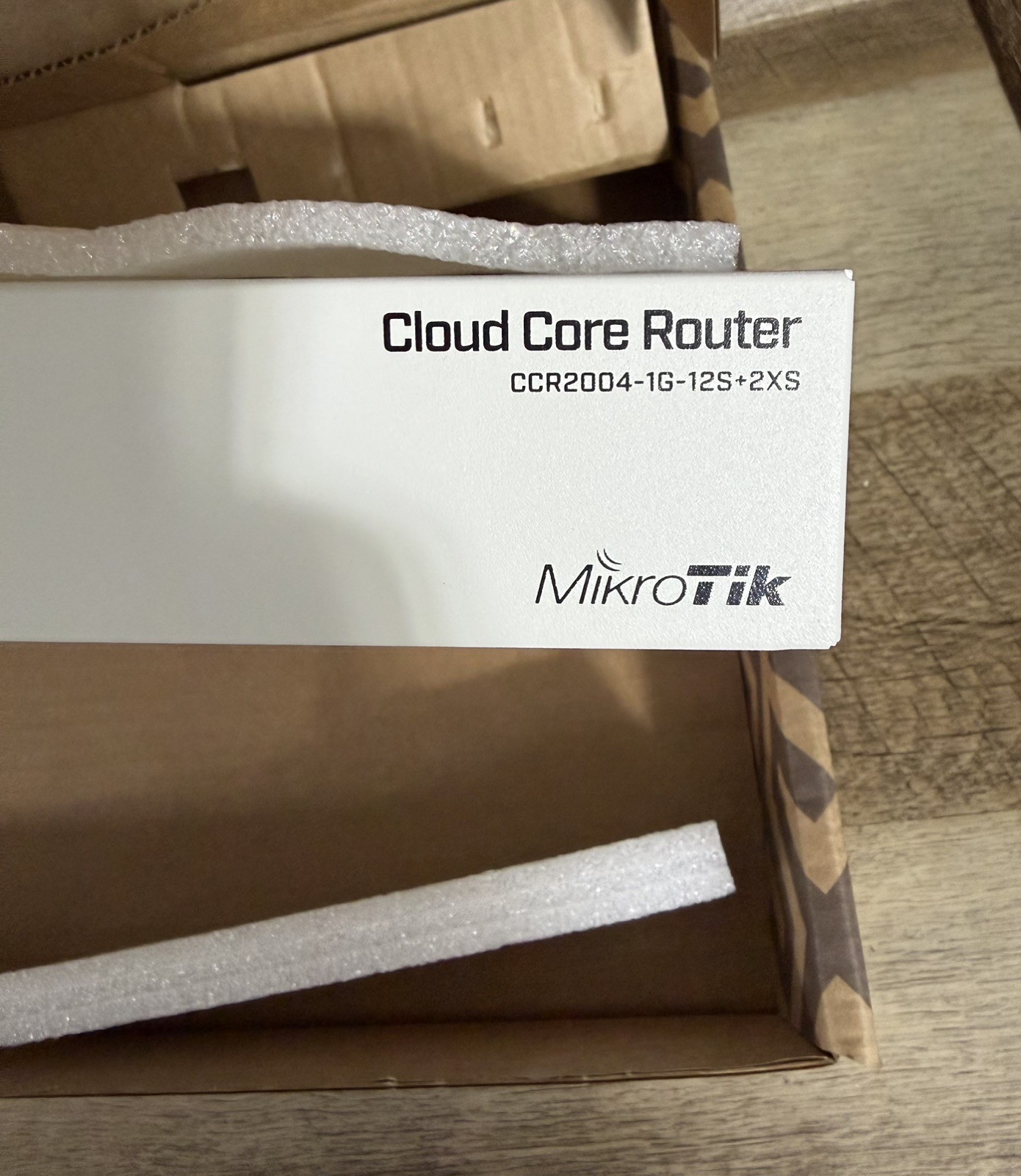 MikroTik Cloud Core Router CCR2004-1G-12S+2XS-New, Never Used. 