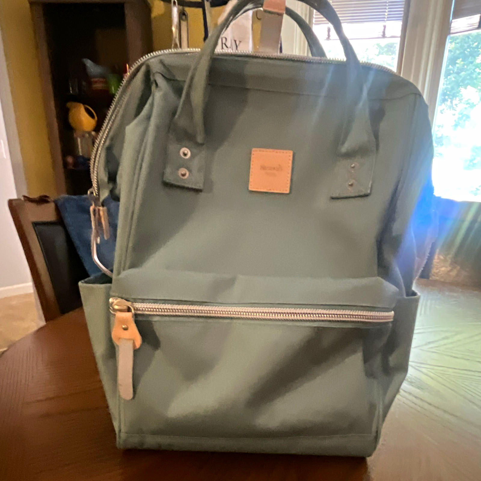Himawari Laptop Bag Backpack Blue Solid Adjustable Strap Zipper Front Pocket