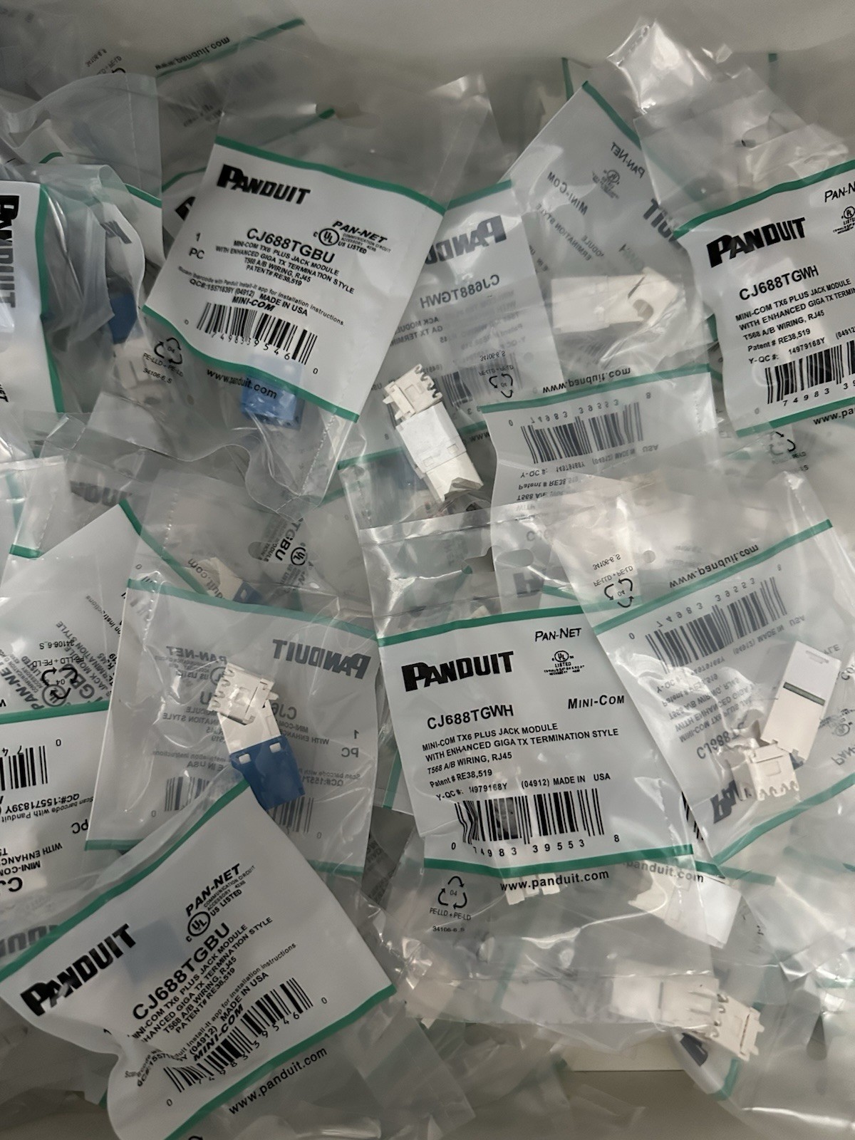 Panduit Mini-Com UTP RJ45 Cat 6 TG Jack Module - 25-WHITE/25-BLUE 