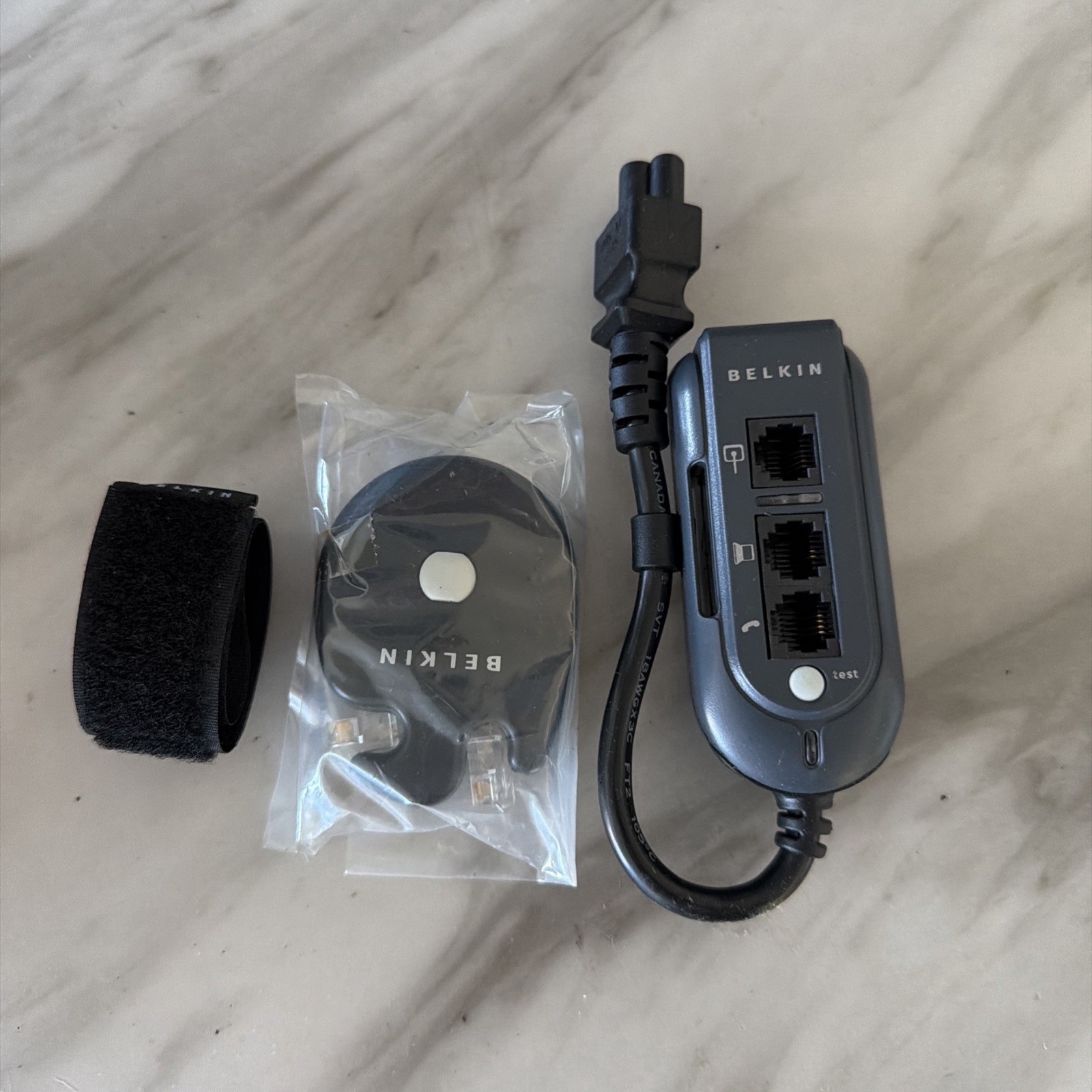 Belkin Notebook Travel Surge Protector Pack & Retractable Dial-up Patch Cord