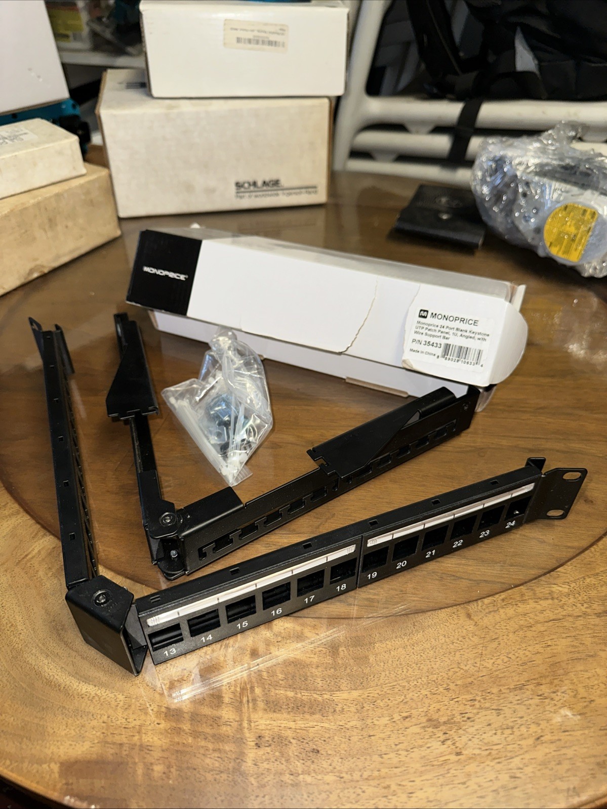 Monoprice 24-Port Blank Keystone UTP Patch Panel, 1U, Angled w/ Wire Support Bar