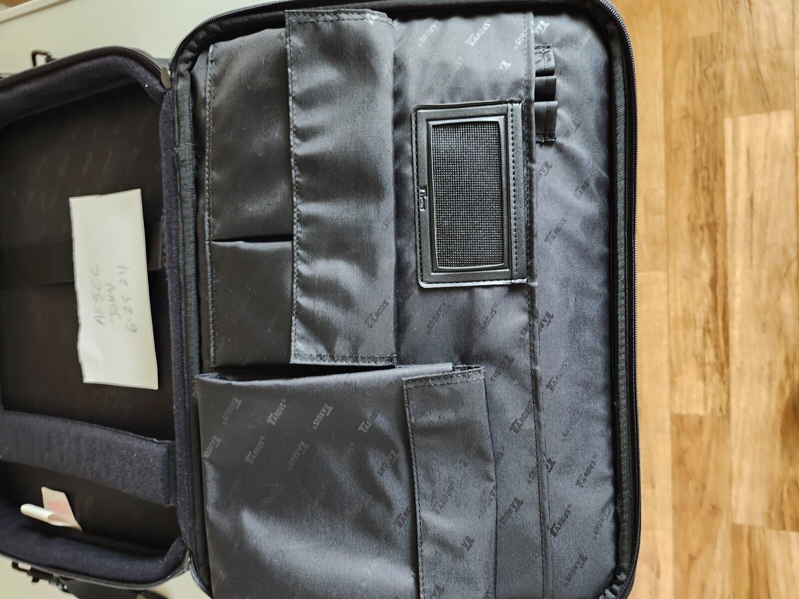 Targus  canvas laptop carry case-16 inches, pockets, adjustable shoulder strap