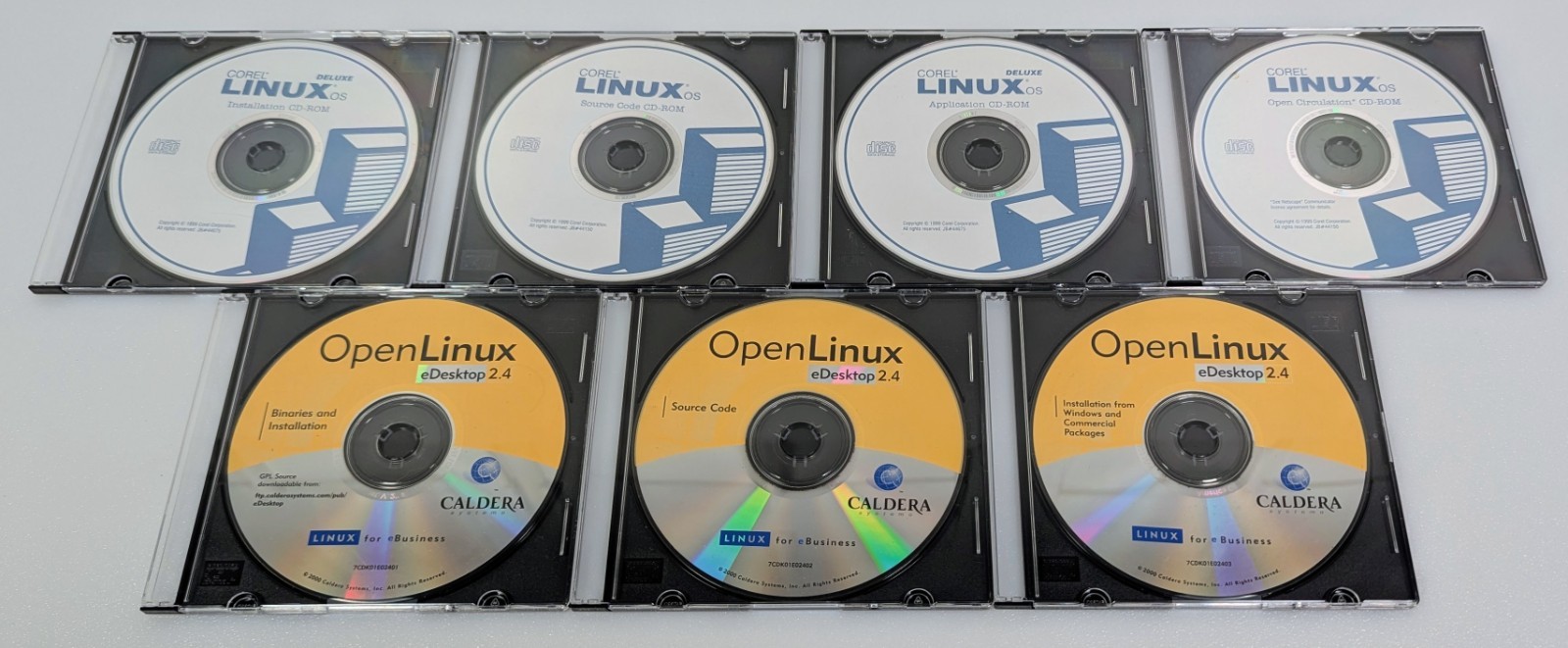 Corel Linux OS & Caldera Systems Open Linux eDesktop 2.4 - 7 CD Lot