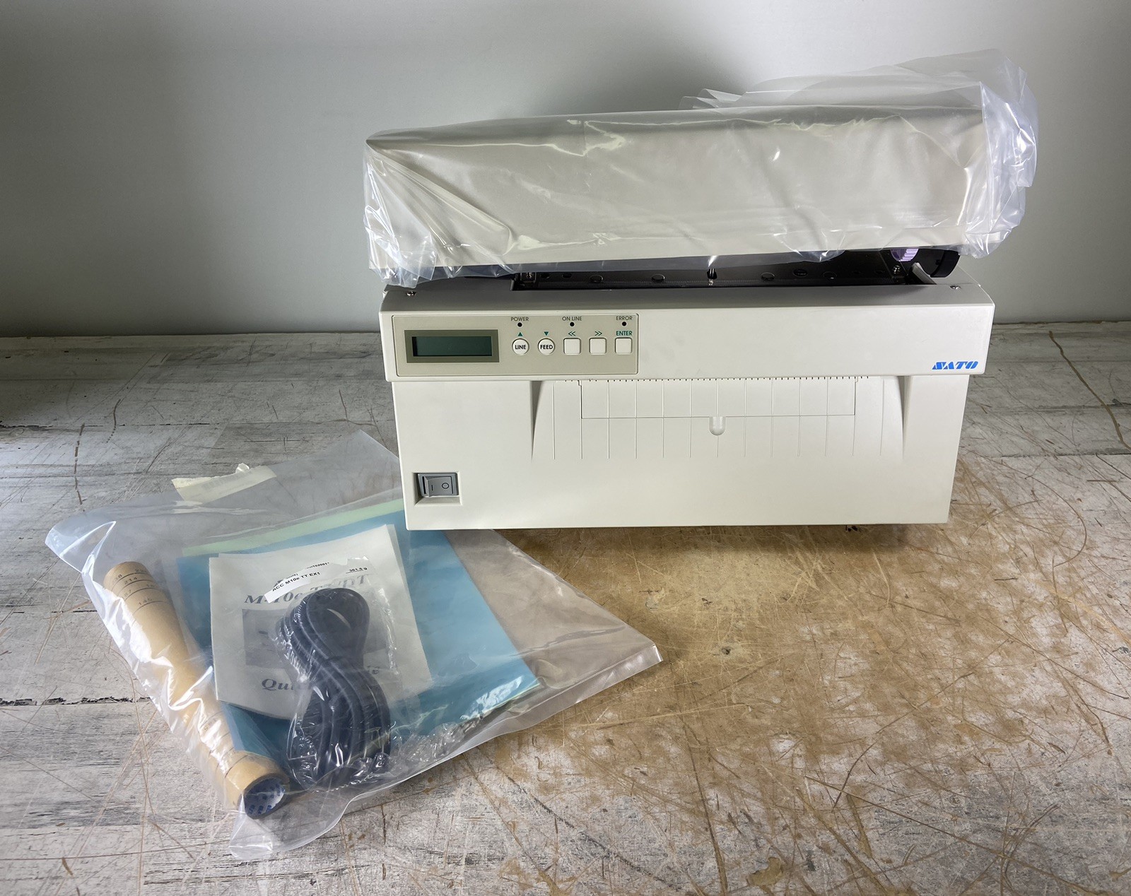SATO M-10E INDUSTRIAL THERMAL LABEL PRINTER W/ ORIGINAL PACKAGE - (POWER TESTED)