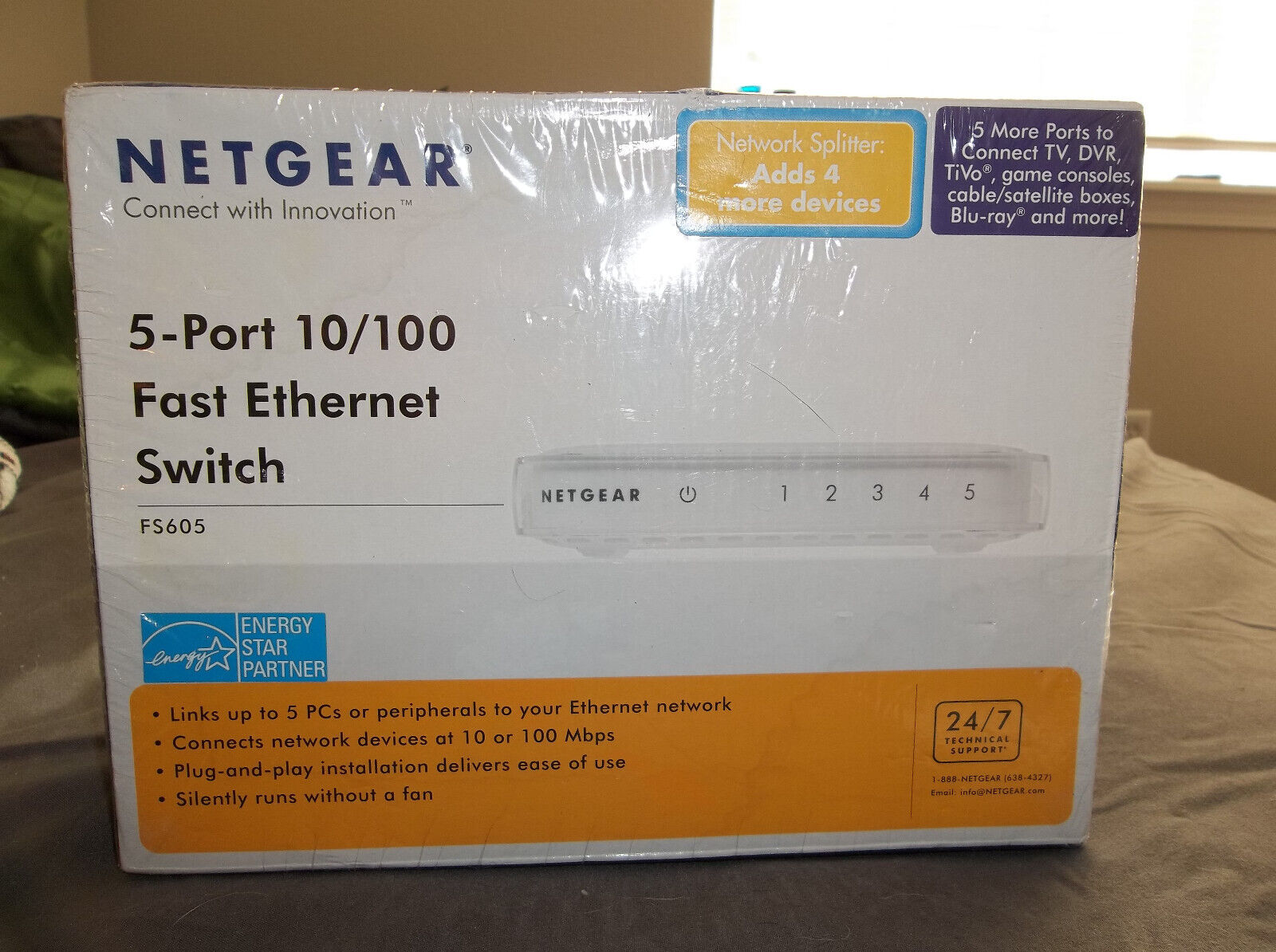 Netgear 5-port 10/100 fast ethernet switch. Unopened.FS605 model