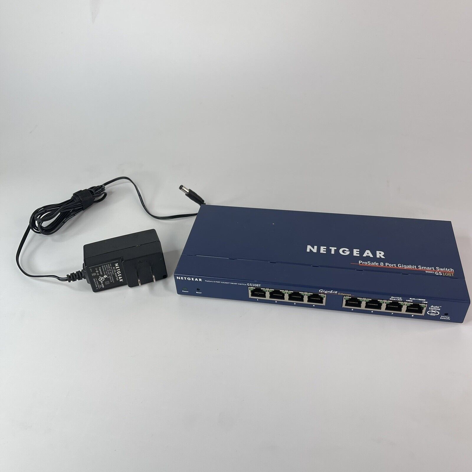 Used NETGEAR 8-Port Gigabit Ethernet Smart Managed Pro Switch GS108T v1h1