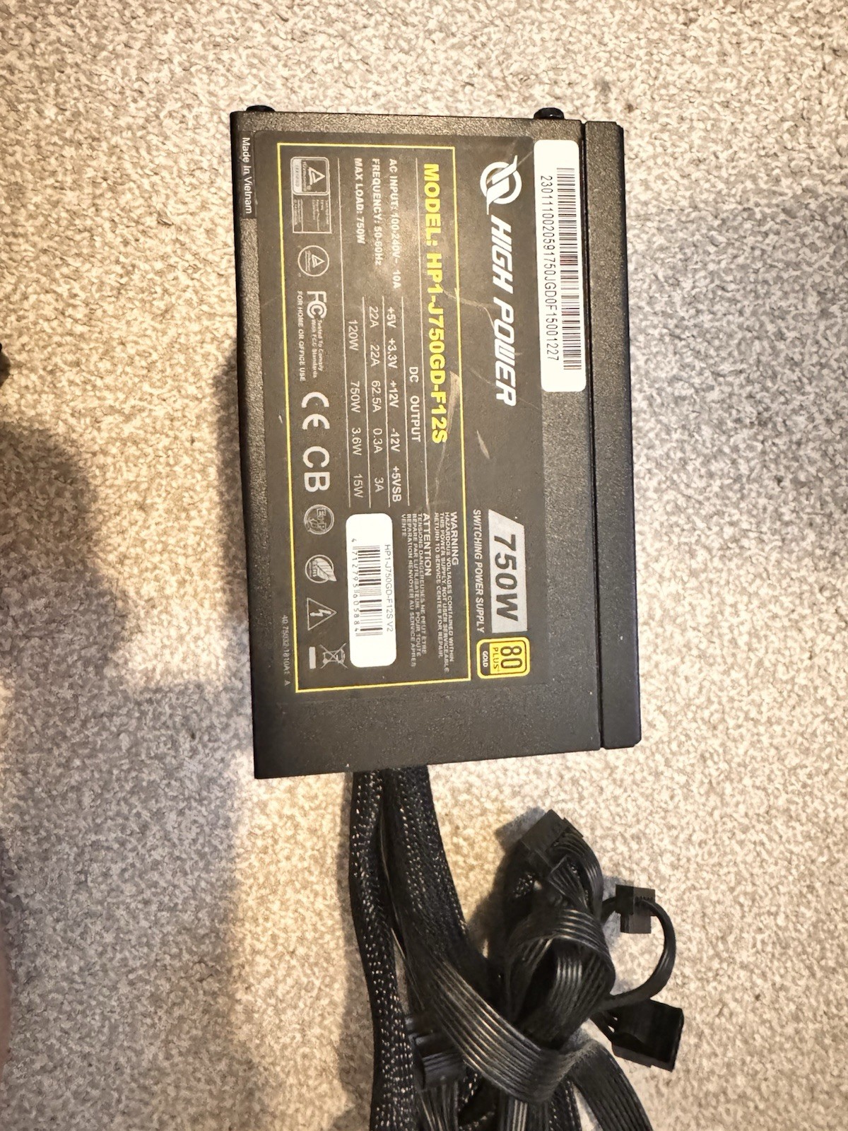 High Power 750W (Model HP1-J750GD-F12S) ATX power supply with an 80 Plus Gold