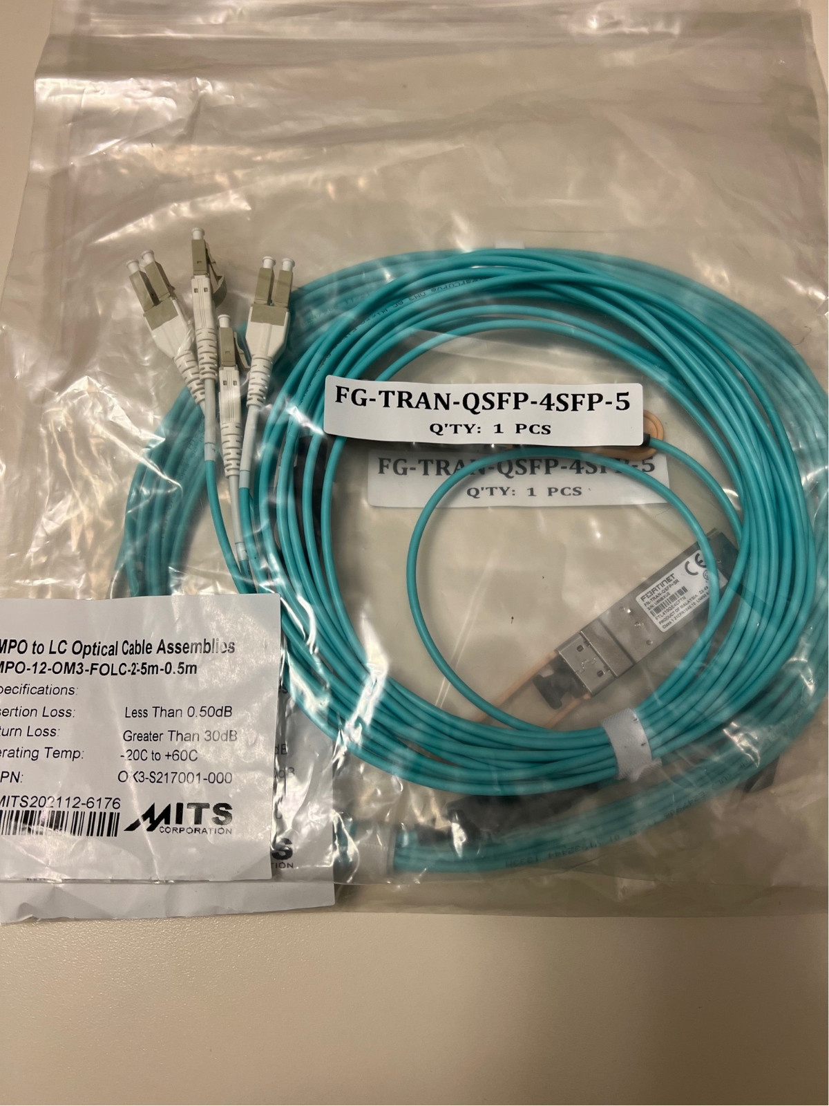 Genuine Fortinet FG-TRAN-QSFP-4FTP-5 breakout cable with QSFP+ SR transceiver