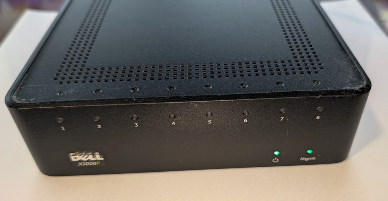 Dell X1008P 8P 1GbE 123W PoE Managed Switch With Power Adapter Tested working.