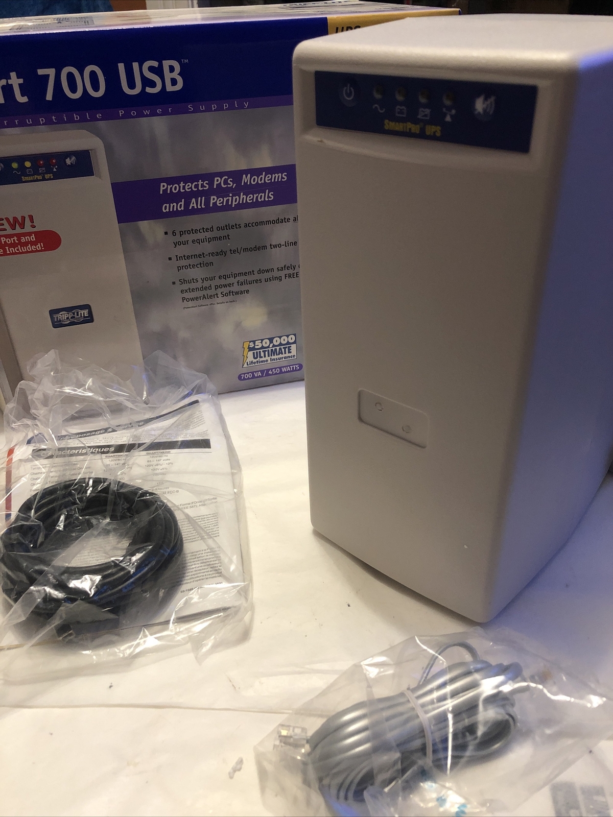 Tripp-Lite Smart 700 USB With Battery Backup And Surge Protection