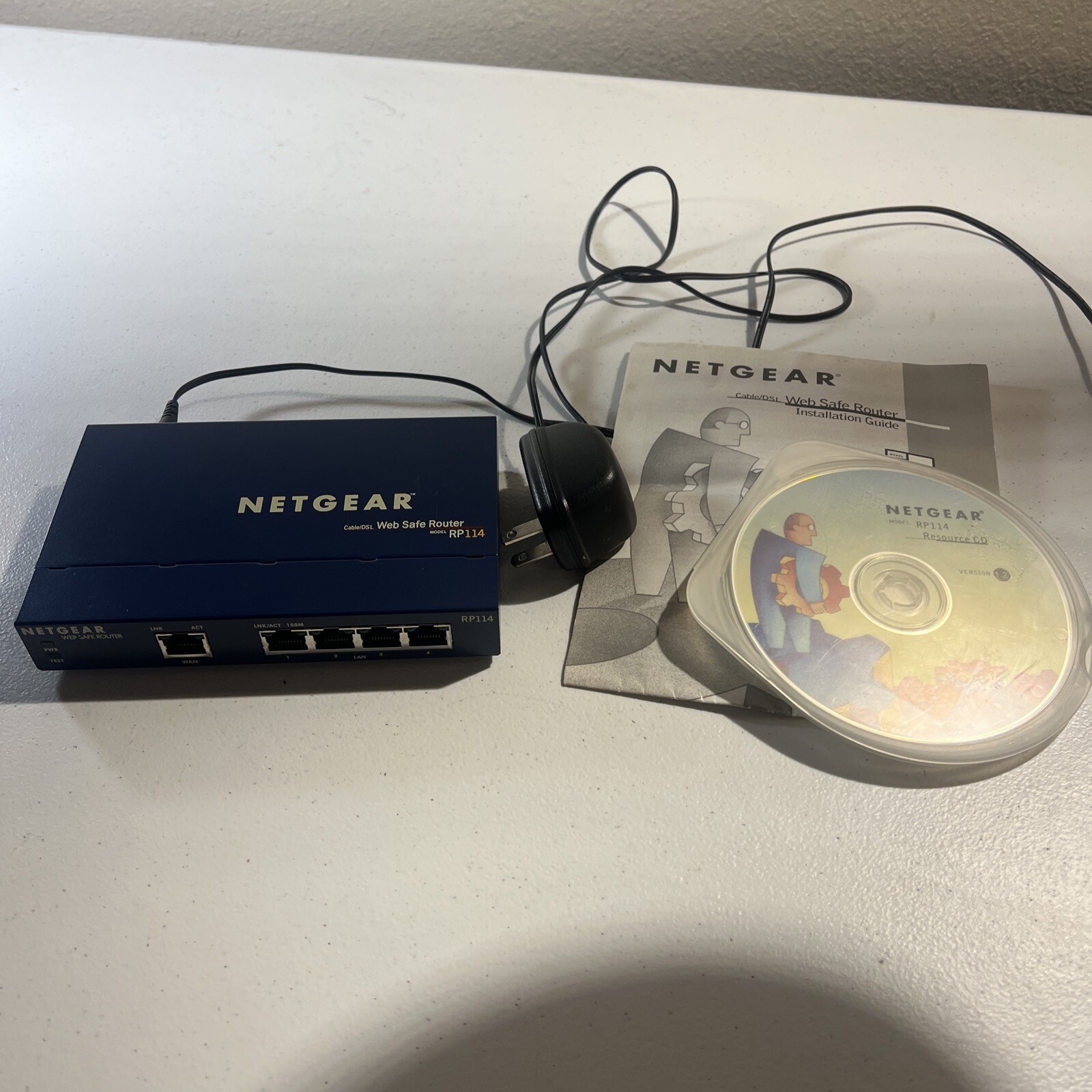 Netgear Cable/DSL Web Safe Router. Model: RP114. Works