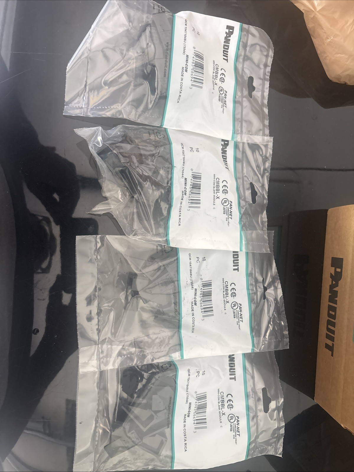 4 Bags of 10 Panduit Pan-Net CMBBL-X Mini-Com 1-Port Blank Module Black