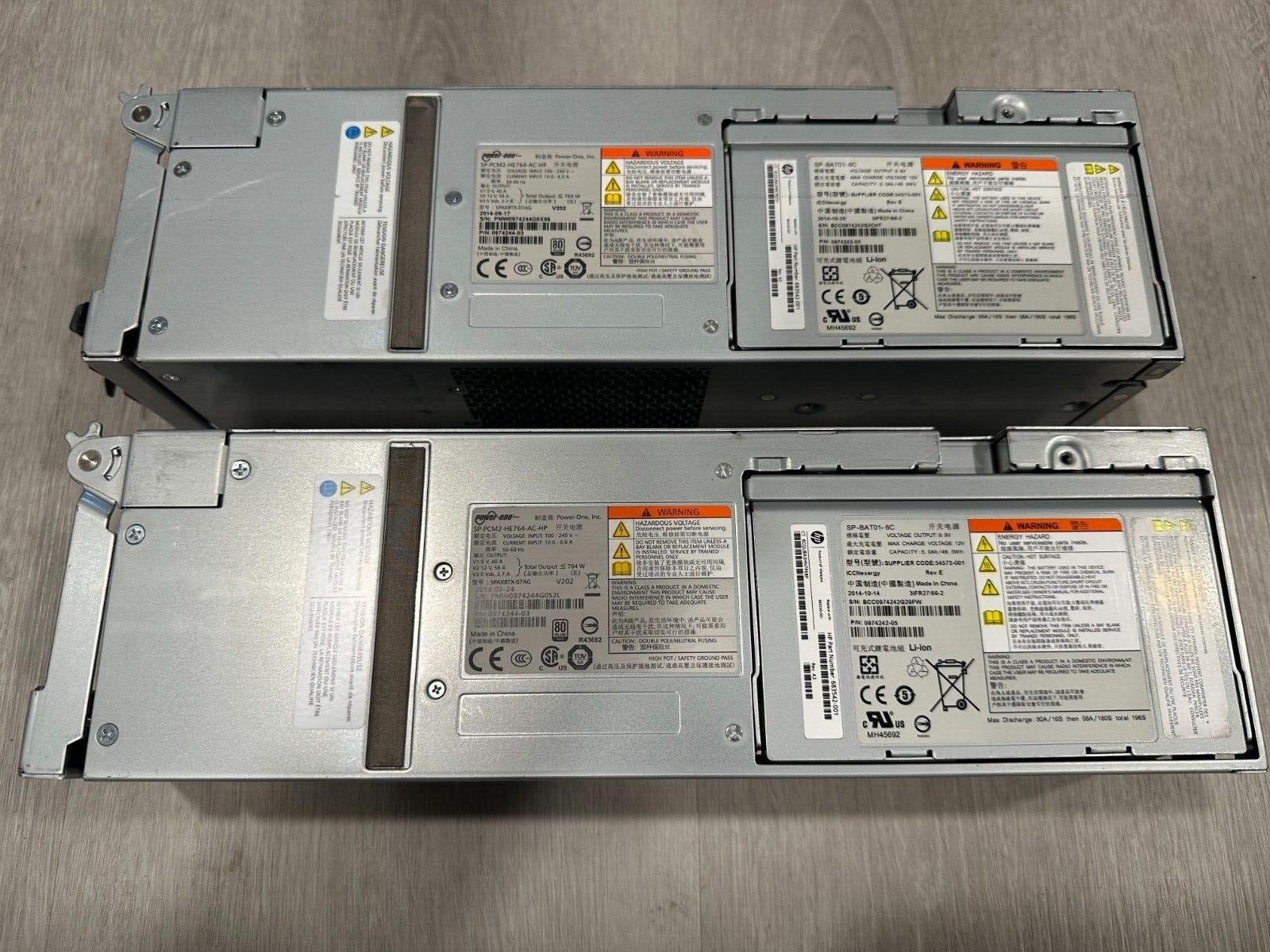 2x HP Power One SP-PCM2-HE764-AC-HP/SP-BAT01-6C 764W  Power Supply Battery