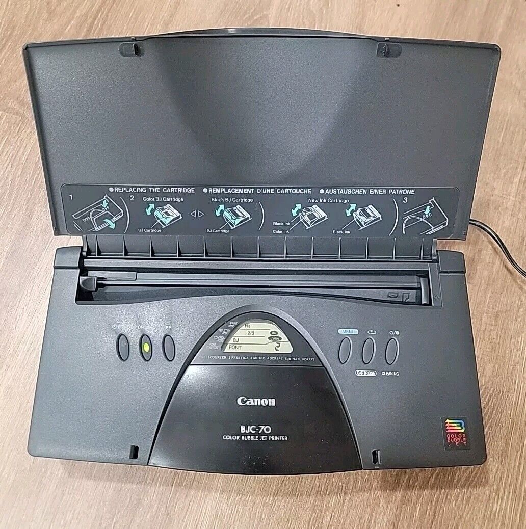 Canon BJC 70 Portible Color Printer Powers On.