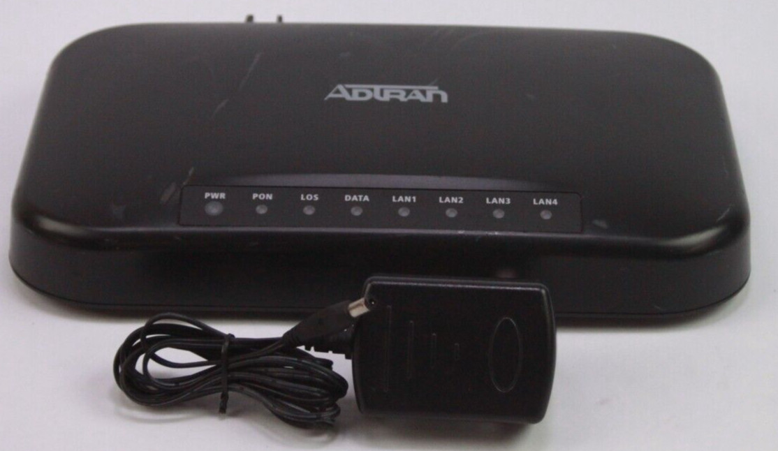 ADTRAN Model #1004 176100430F1 With Power Adapter Powers On READ As Is
