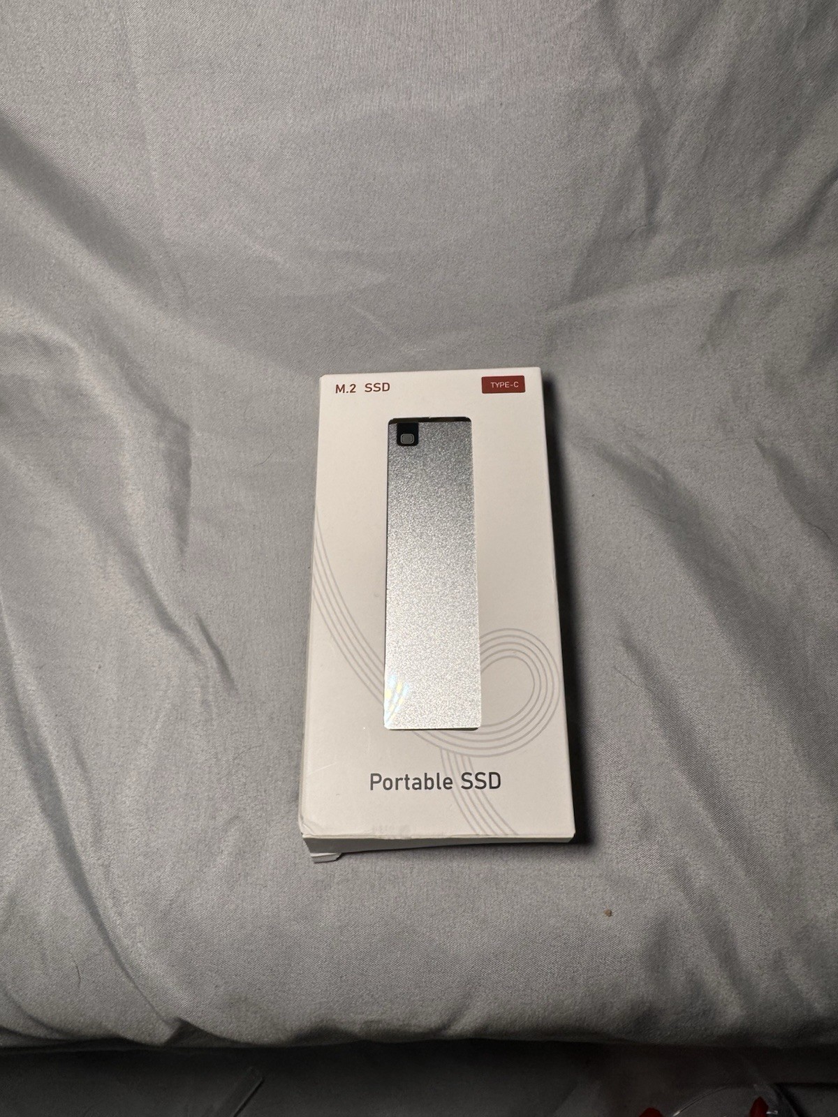 generic brand portable M.2 SSD enclosure in silver with Type-C connectivity