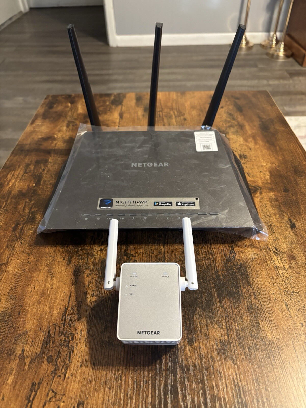 NetGear Nighthawk AC1900 WiFi Router and NetGear AC750 WiFi Range Extender.