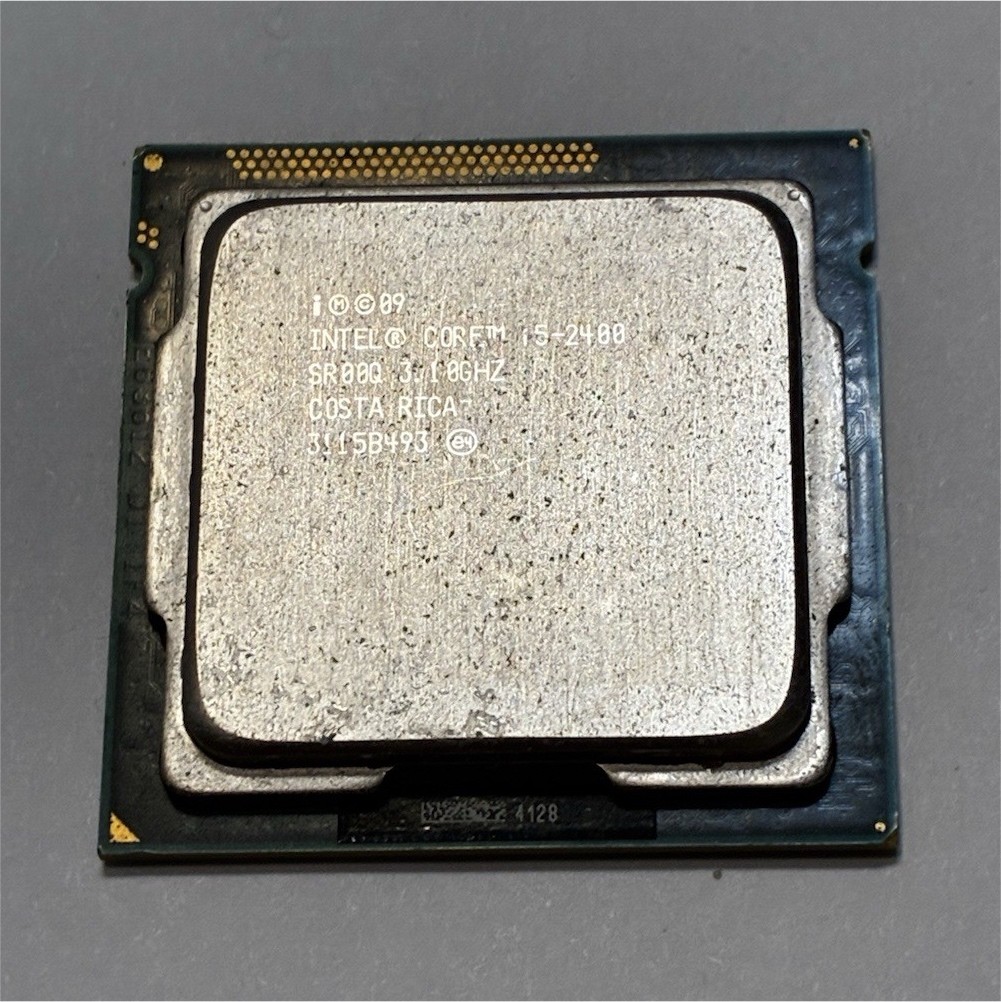 Intel Core i5-2400 3.10GHz Quad-Core LGA1155 6MB  (slightly scratched)