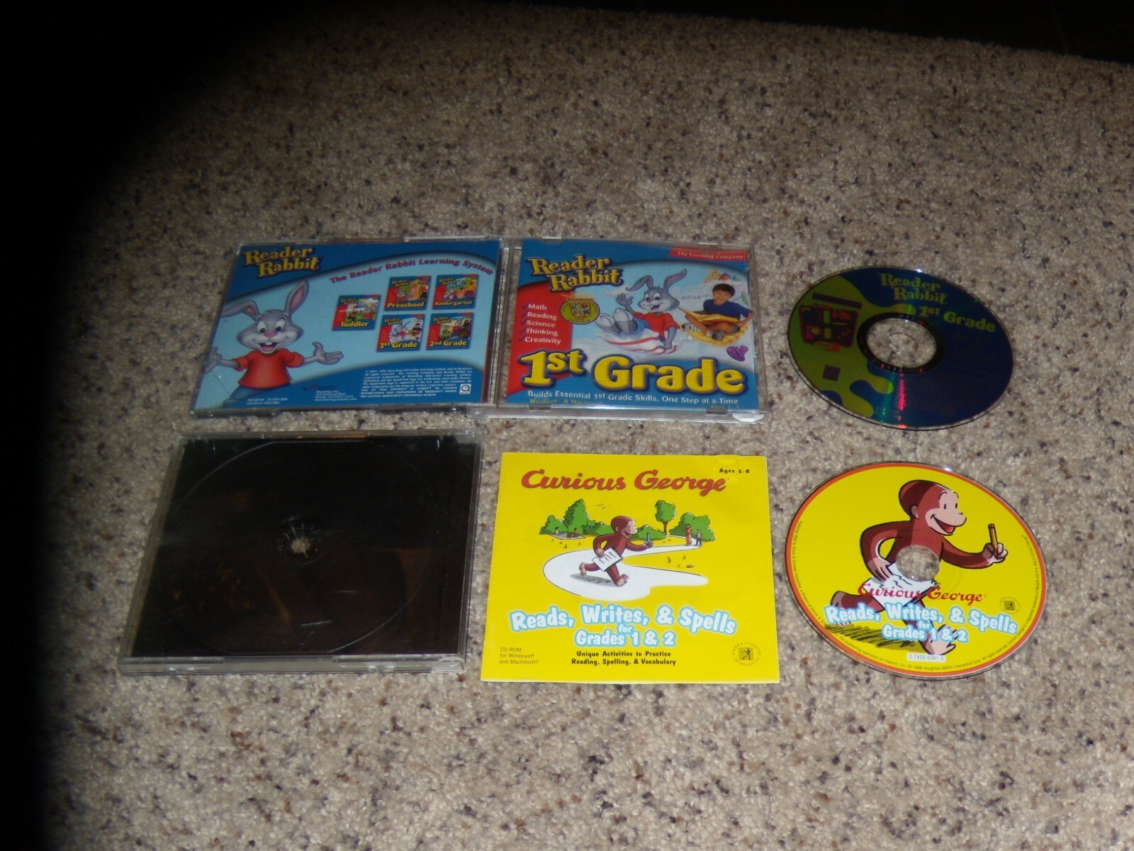 Curious George Reads, Writes & Spells Grades 1 & 2 and Reader Rabbit 1st Grade