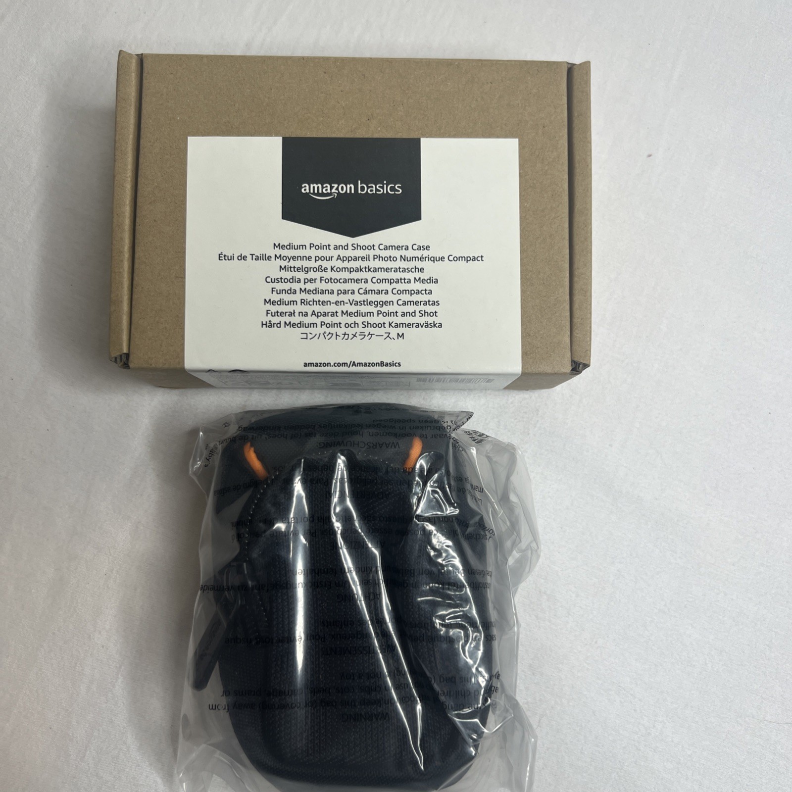 Amazon Basics Medium Point and Shoot Camera Casewith Internal Paddin Black Solid