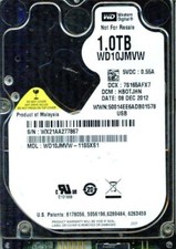 WD10JMVW-11S5XS1,  DCM: HB0TJHN  WESTERN DIGITAL USB3 1TB  WX21  DEC 2012 picture