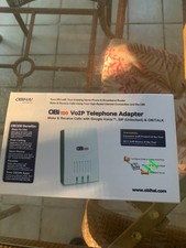 OBIHAI OBi100 VoIP Telephone Adapter Make and receive calls with Google Voice picture