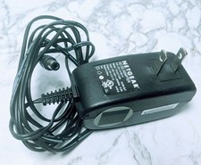 OEM NETGEAR AC-DC ADAPTER P/N# 332-10166-01 model # T012LF1209 12V 1A G5.4 picture