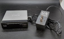Desk Top Switch Cisco SF100D-05 5-Port 10/100  Business/Home Ethernet W/charger. picture