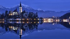 Landscape lake bled reflection mountains city lights Custom Gaming Mat Desk picture