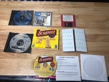 90s Windows 95 disc, Sim City CD Rom, scrabble champion, Ancients Deathwatch picture