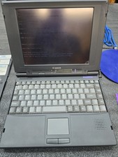 VINTAGE  Canon Innova Book 360CD Powers On With Case Extras picture