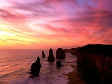 Landscape sunset orange sky coast cliff rock formation Custom Gaming Mat Desk picture